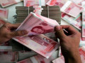 اليوان الصيني يتراجع في مقابل الدولار الامريكي