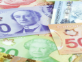 الدولار الأمريكي مقابل الكندي يتمكن من تحقيق الهدف الإيجابي الأول