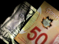 الدولار الكندى يرتفع مجددا مستهدفا لمستويات قياسية