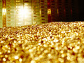 أوقية الذهب تلامس مستويات قياسية