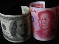 اليوان الصيني يفشل في إثارة الذعر بين متداولي العملات الاجنبية